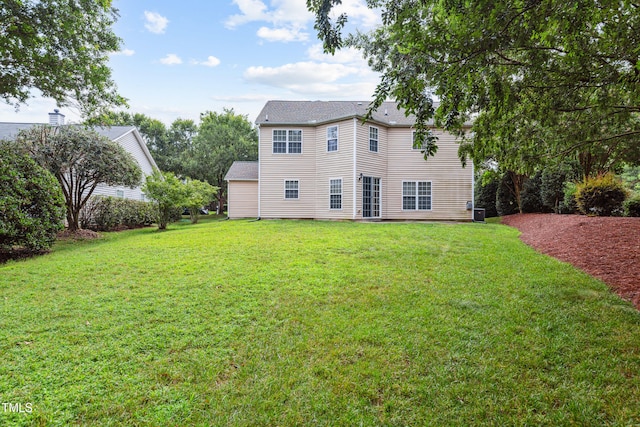2228 Cedar Grove Dr, Durham, NC 27703 - rear view of house with a yard