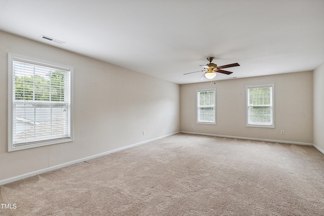 2228 Cedar Grove Dr, Durham, NC 27703 - carpeted empty room featuring a ceiling fan and baseboards