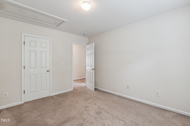 2228 Cedar Grove Dr, Durham, NC 27703 - unfurnished bedroom with carpet flooring and attic access