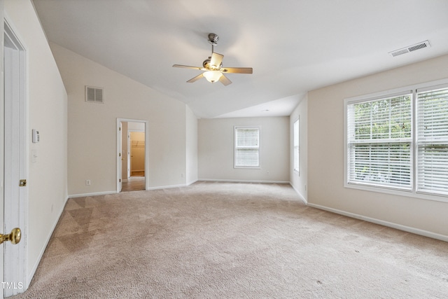 2228 Cedar Grove Dr, Durham, NC 27703 - spare room featuring light colored carpet, a ceiling fan, and lofted ceiling