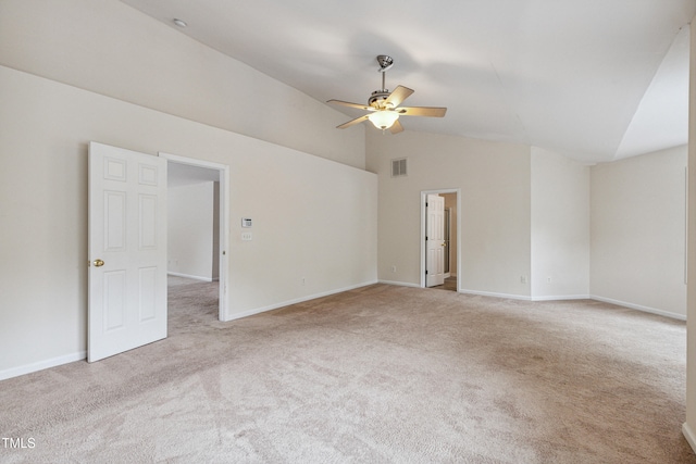 2228 Cedar Grove Dr, Durham, NC 27703 - empty room featuring vaulted ceiling, a ceiling fan, and light colored carpet