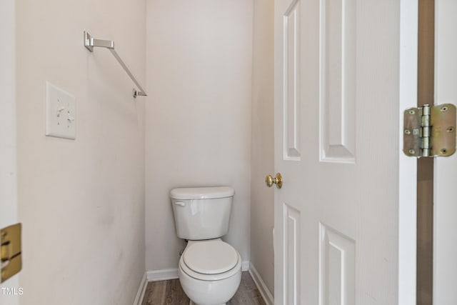 2228 Cedar Grove Dr, Durham, NC 27703 - bathroom with toilet and wood finished floors