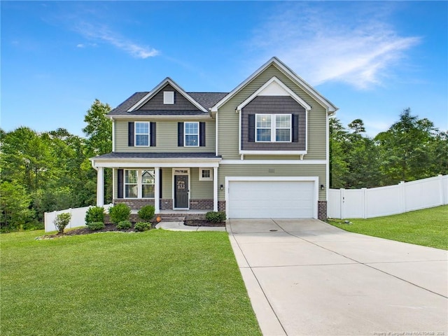 448 Pittfield Run, Cameron, NC 28326 - craftsman-style house with brick siding, concrete driveway, covered porch, and a garage