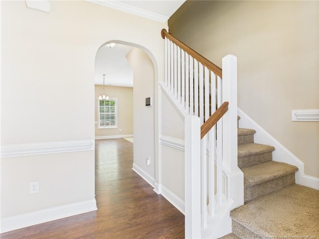 448 Pittfield Run, Cameron, NC 28326 - stairs with arched walkways, wood finished floors, and crown molding