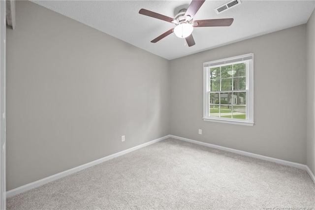 615 Wallingford Ct, Fayetteville, NC 28314 - carpeted empty room featuring ceiling fan and a textured ceiling