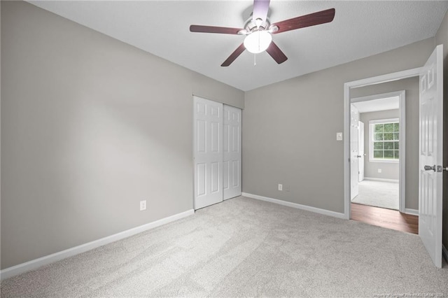 615 Wallingford Ct, Fayetteville, NC 28314 - unfurnished bedroom featuring carpet, a closet, and ceiling fan