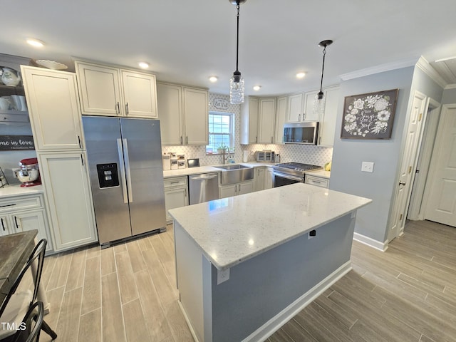 4411 Fairland Ct, Burlington, NC 27215 - kitchen featuring appliances with stainless steel finishes, light wood-style flooring, ornamental molding, tasteful backsplash, and light stone countertops