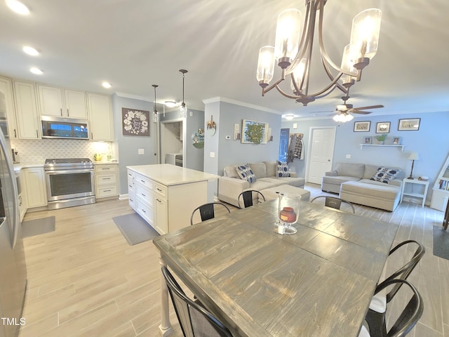 4411 Fairland Ct, Burlington, NC 27215 - dining area with a ceiling fan, ornamental molding, a chandelier, light wood-style flooring, and recessed lighting