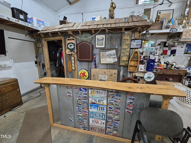 4411 Fairland Ct, Burlington, NC 27215 - bar area with concrete floors and vaulted ceiling