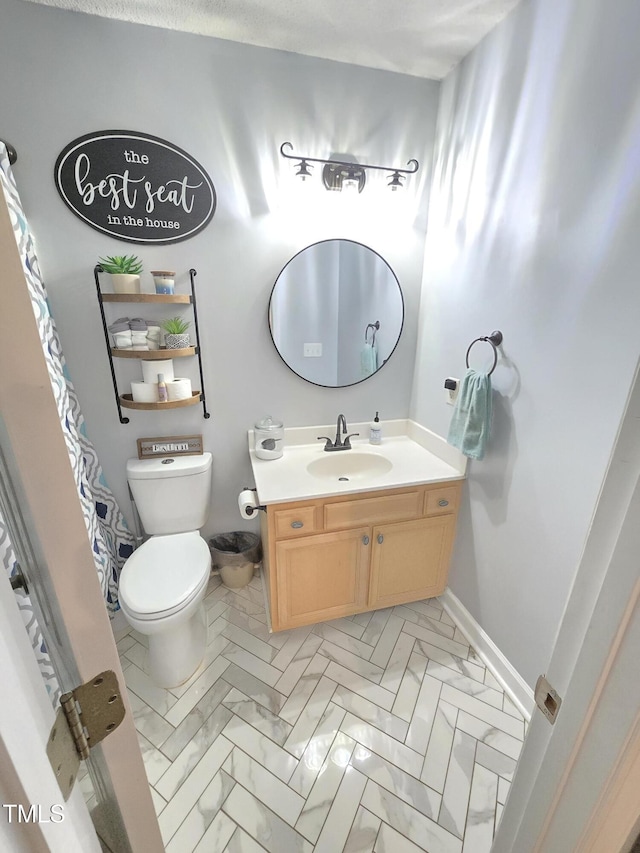 4411 Fairland Ct, Burlington, NC 27215 - bathroom featuring vanity and toilet
