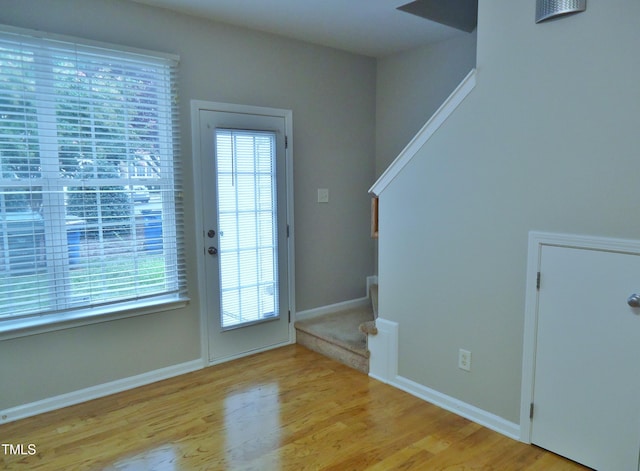 8315 City Loft Ct, Raleigh, NC 27613 - foyer featuring wood finished floors and stairs