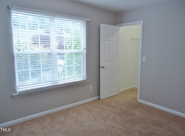 8315 City Loft Ct, Raleigh, NC 27613 - unfurnished room featuring carpet flooring and baseboards