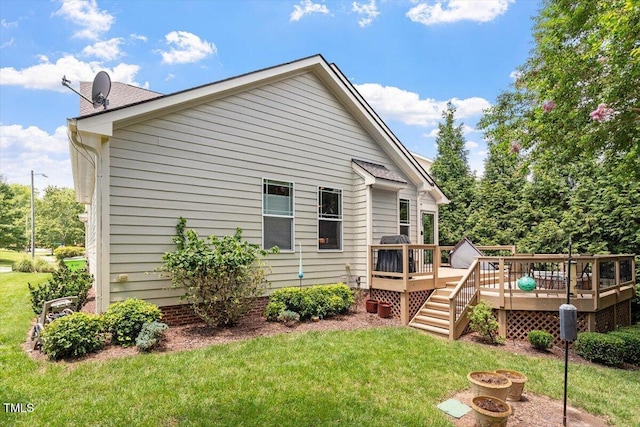 2800 Royal Forrest Dr, Raleigh, NC 27614 - back of property featuring a lawn, a deck, and a fire pit