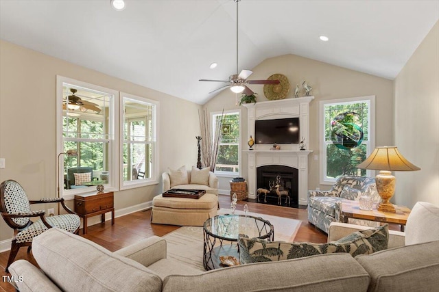 2800 Royal Forrest Dr, Raleigh, NC 27614 - living room with ceiling fan, vaulted ceiling, wood finished floors, a fireplace, and recessed lighting
