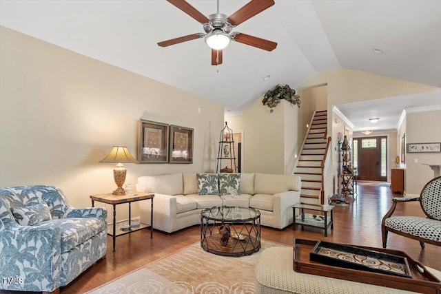 2800 Royal Forrest Dr, Raleigh, NC 27614 - living area featuring wood finished floors, lofted ceiling, stairs, and ceiling fan
