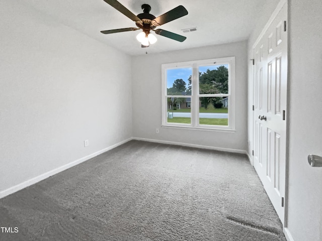 1628 Winnabow Dr, Fayetteville, NC 28304 - unfurnished bedroom featuring carpet, a closet, and a ceiling fan