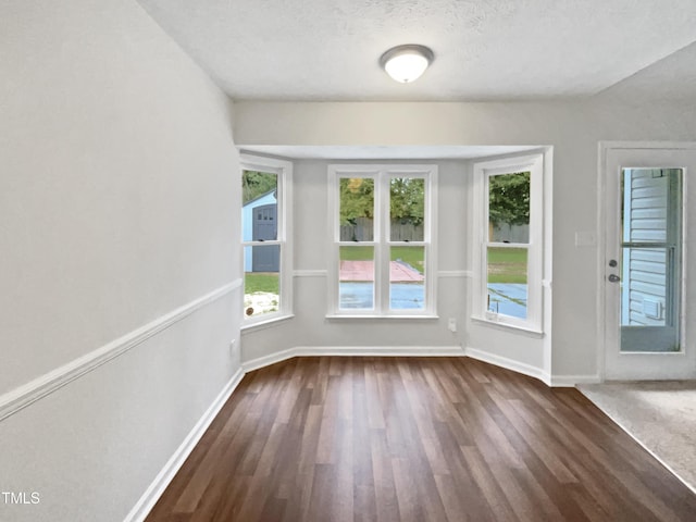 1628 Winnabow Dr, Fayetteville, NC 28304 - empty room featuring dark wood-style flooring and baseboards