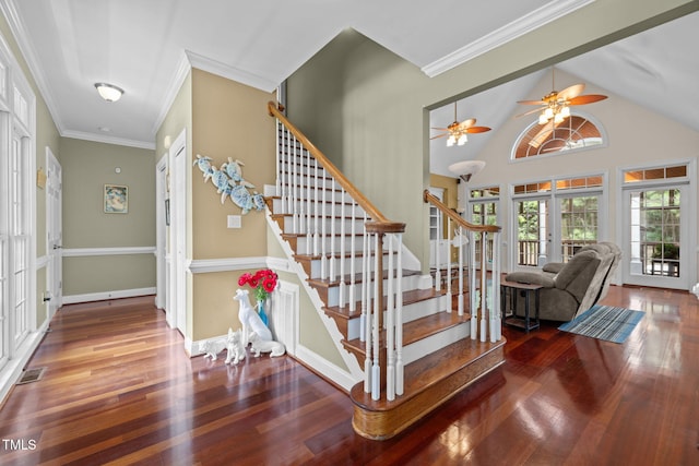 430 Beechwood Trl, Henderson, NC 27536 - staircase featuring wood finished floors, ceiling fan, lofted ceiling, and ornamental molding