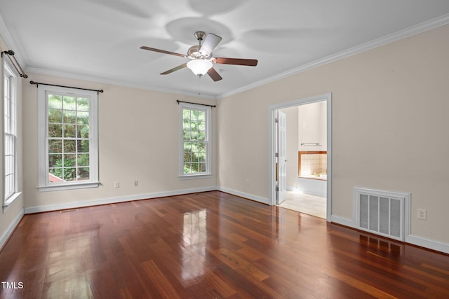 430 Beechwood Trl, Henderson, NC 27536 - empty room featuring wood finished floors, healthy amount of natural light, a ceiling fan, and crown molding