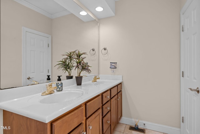 430 Beechwood Trl, Henderson, NC 27536 - full bathroom with double vanity, tile patterned floors, and ornamental molding