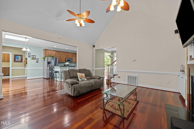 430 Beechwood Trl, Henderson, NC 27536 - living area featuring ceiling fan, high vaulted ceiling, and wood finished floors