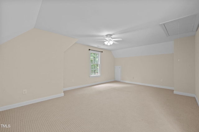 430 Beechwood Trl, Henderson, NC 27536 - additional living space featuring vaulted ceiling, a ceiling fan, attic access, and light carpet