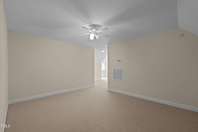 430 Beechwood Trl, Henderson, NC 27536 - bonus room with a ceiling fan, lofted ceiling, and light colored carpet