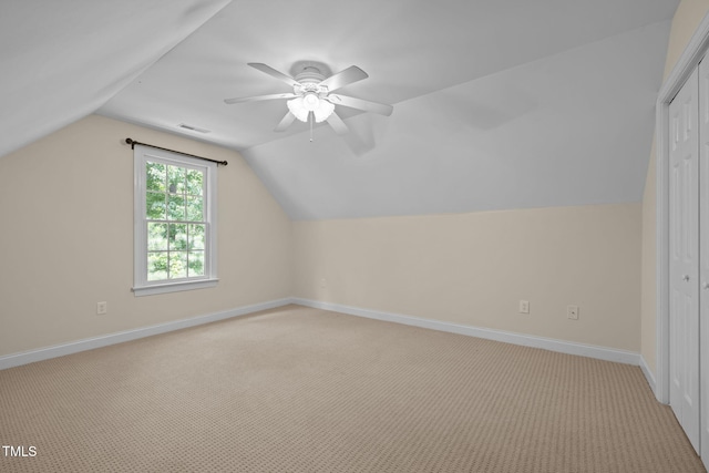 430 Beechwood Trl, Henderson, NC 27536 - additional living space with vaulted ceiling, light colored carpet, and ceiling fan