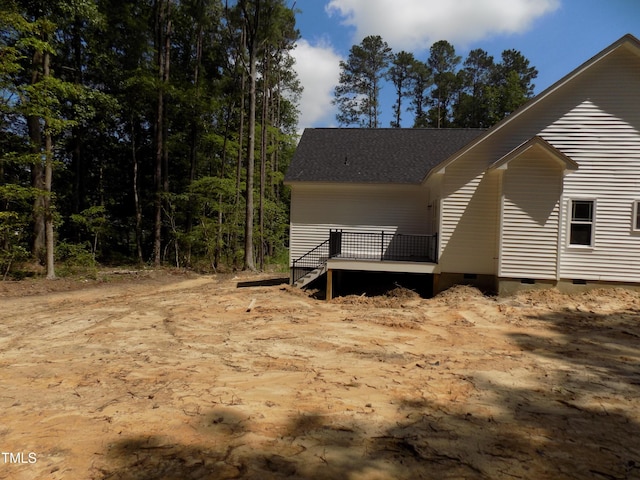 560 S N C 39 Hwy, Louisburg, NC 27549 - view of side of home featuring crawl space, a wooden deck, and roof with shingles