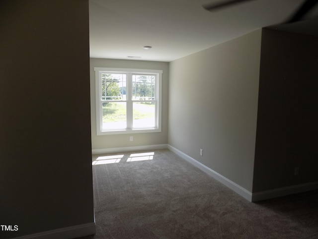 560 S N C 39 Hwy, Louisburg, NC 27549 - unfurnished room featuring carpet floors and baseboards