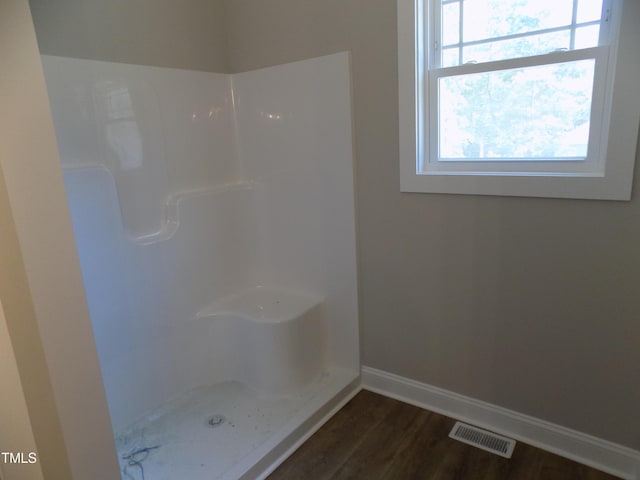 560 S N C 39 Hwy, Louisburg, NC 27549 - bathroom featuring a shower and wood finished floors