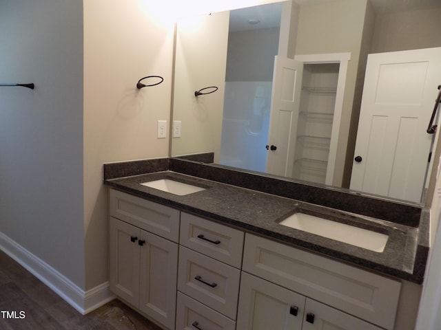 560 S N C 39 Hwy, Louisburg, NC 27549 - full bath featuring double vanity and wood finished floors