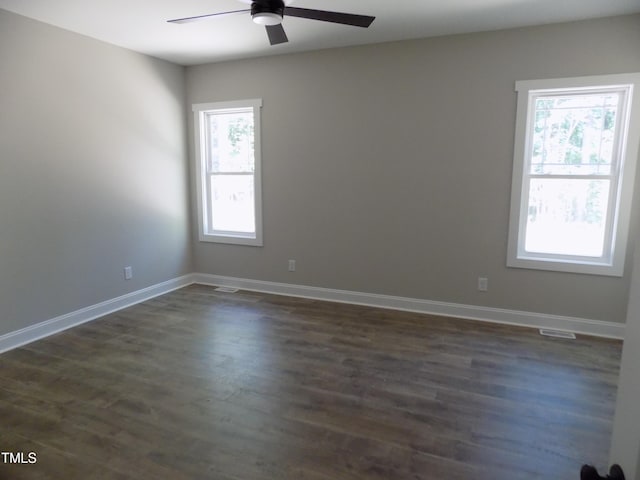 560 S N C 39 Hwy, Louisburg, NC 27549 - spare room with ceiling fan and dark wood-type flooring