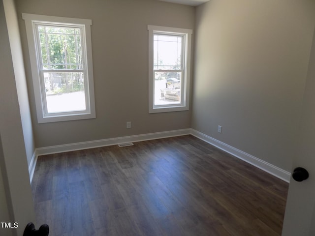 560 S N C 39 Hwy, Louisburg, NC 27549 - spare room with dark wood-style floors and baseboards