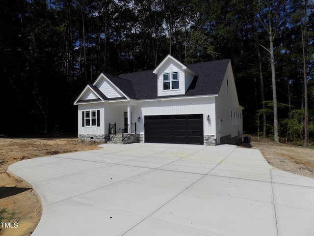 560 S N C 39 Hwy, Louisburg, NC 27549 - modern farmhouse style home with concrete driveway, a garage, crawl space, and roof with shingles