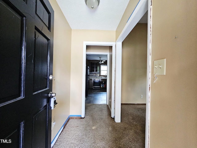 746 Glen Reilly Dr, Fayetteville, NC 28314 - foyer entrance featuring carpet and baseboards