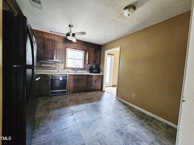 746 Glen Reilly Dr, Fayetteville, NC 28314 - kitchen with black appliances, light countertops, ceiling fan, dark brown cabinets, and a textured ceiling