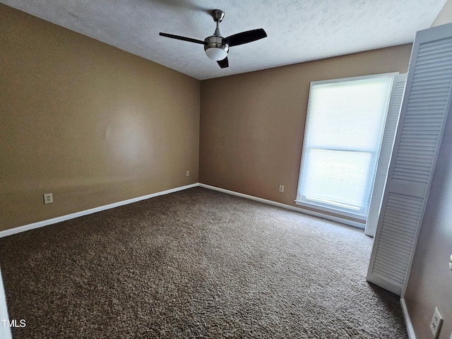 746 Glen Reilly Dr, Fayetteville, NC 28314 - empty room with carpet flooring, a ceiling fan, and a textured ceiling