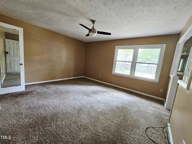 746 Glen Reilly Dr, Fayetteville, NC 28314 - spare room with a ceiling fan, carpet flooring, and a textured ceiling