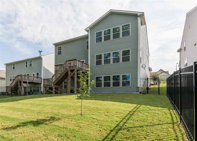 111 Court Jester Way, Morrisville, NC 27560 - back of house featuring stairway and a wooden deck
