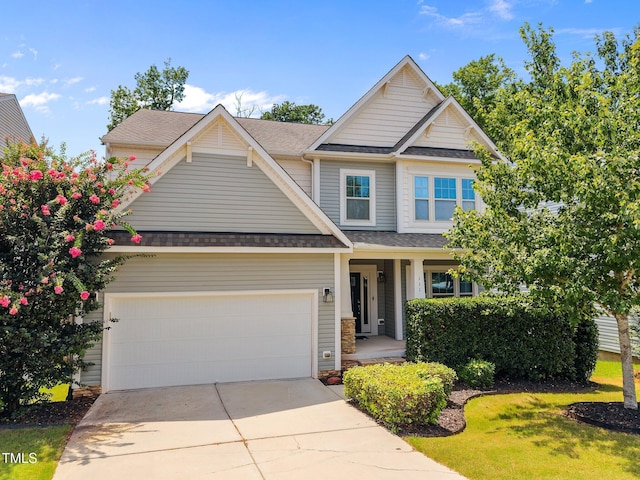 111 Court Jester Way, Morrisville, NC 27560 - craftsman inspired home with a garage, concrete driveway, a shingled roof, and covered porch