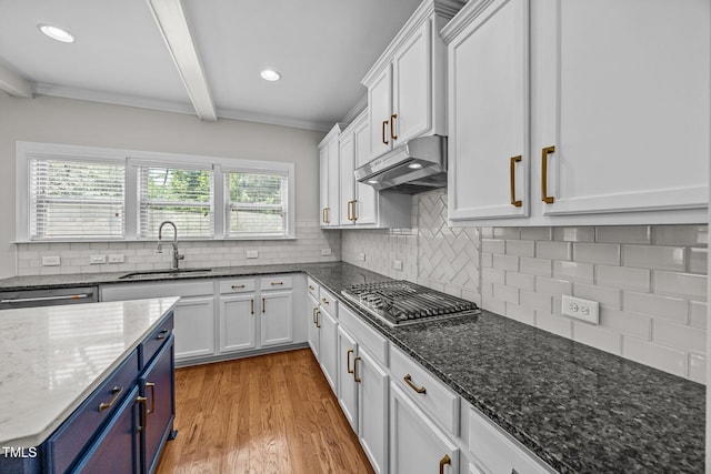 111 Court Jester Way, Morrisville, NC 27560 - kitchen with under cabinet range hood, blue cabinetry, beamed ceiling, white cabinets, and light wood-style floors