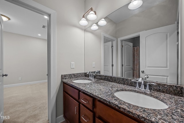 111 Court Jester Way, Morrisville, NC 27560 - bathroom featuring double vanity and baseboards