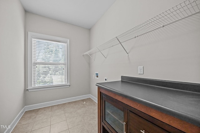 111 Court Jester Way, Morrisville, NC 27560 - laundry area with hookup for an electric dryer, hookup for a washing machine, and light tile patterned floors