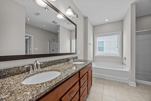 111 Court Jester Way, Morrisville, NC 27560 - bathroom with a stall shower, a bath, double vanity, and tile patterned floors
