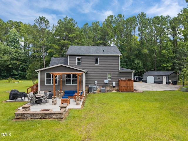 1128 Old Stage Rd S, Erwin, NC 28339 - rear view of property with outdoor lounge area, a patio, a lawn, an outbuilding, and a shingled roof