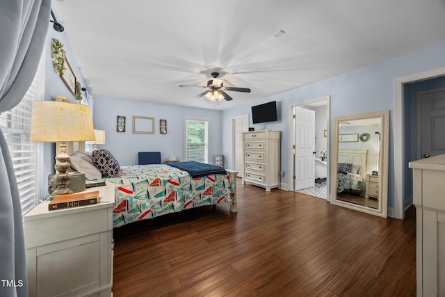 1128 Old Stage Rd S, Erwin, NC 28339 - bedroom with dark wood-style flooring and ceiling fan