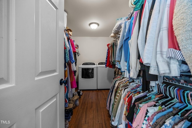1128 Old Stage Rd S, Erwin, NC 28339 - spacious closet with washer and clothes dryer and wood finished floors