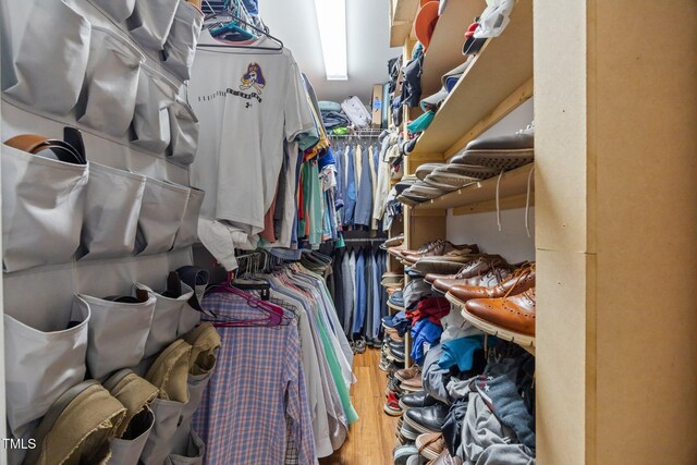 1128 Old Stage Rd S, Erwin, NC 28339 - walk in closet featuring wood finished floors