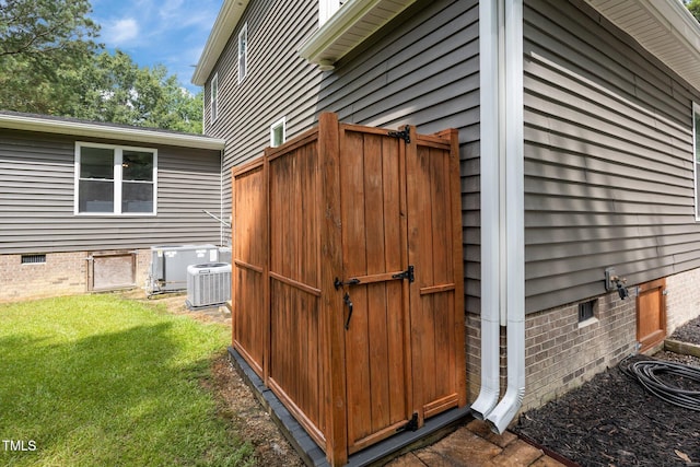 1128 Old Stage Rd S, Erwin, NC 28339 - view of side of home featuring crawl space and a lawn